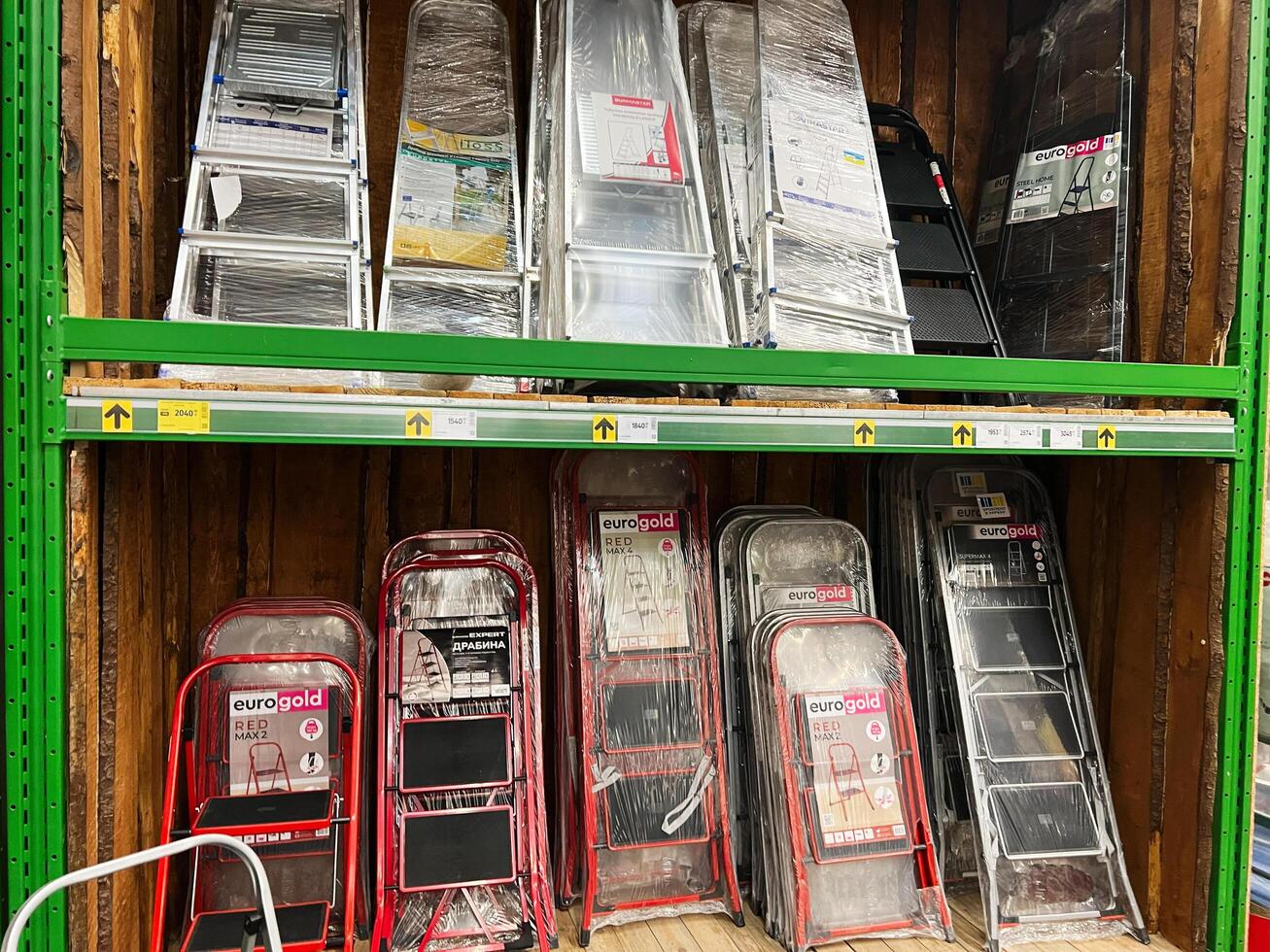 Kyiv, Ukraine - January 03, 2025 Shelf Display of Ladders in a Hardware Store photo