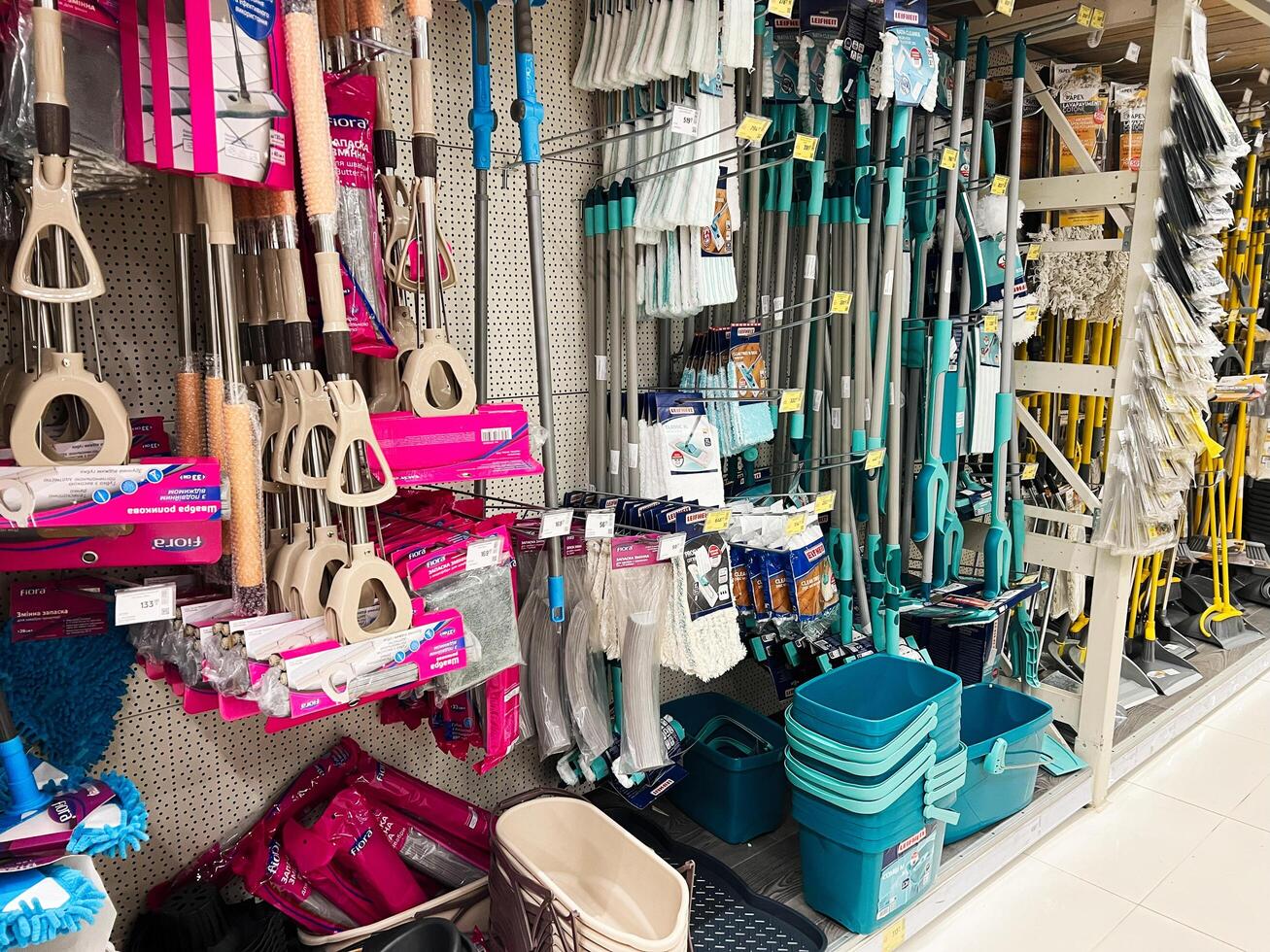 Kyiv, Ukraine - January 03, 2025 Variety of Cleaning Supplies on Display in a Store Aisle photo