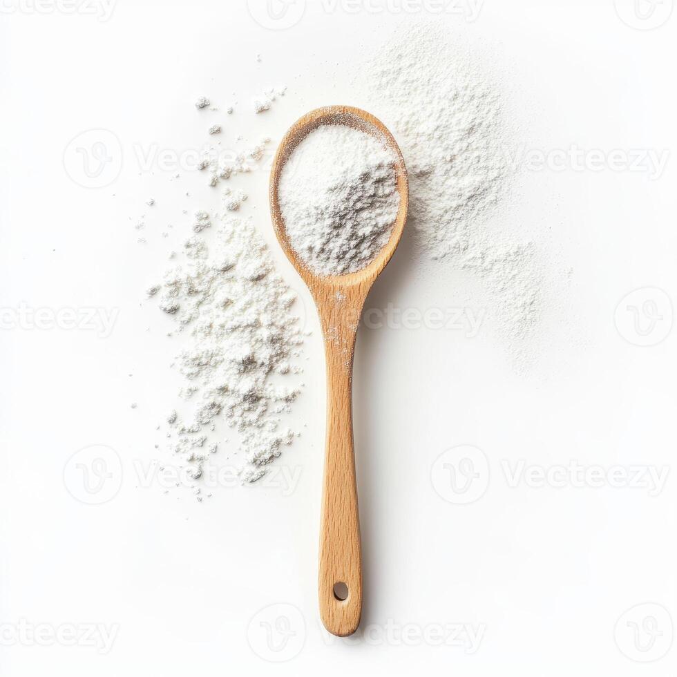 soft textured image of powdered sugar on white background, showcasing its fine granules and wooden spoon photo