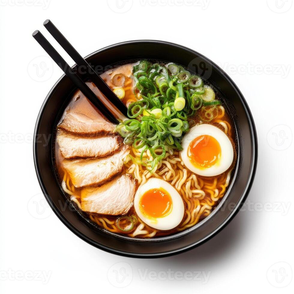 Delicious bowl of ramen with tender pork, soft boiled eggs, and green onions photo