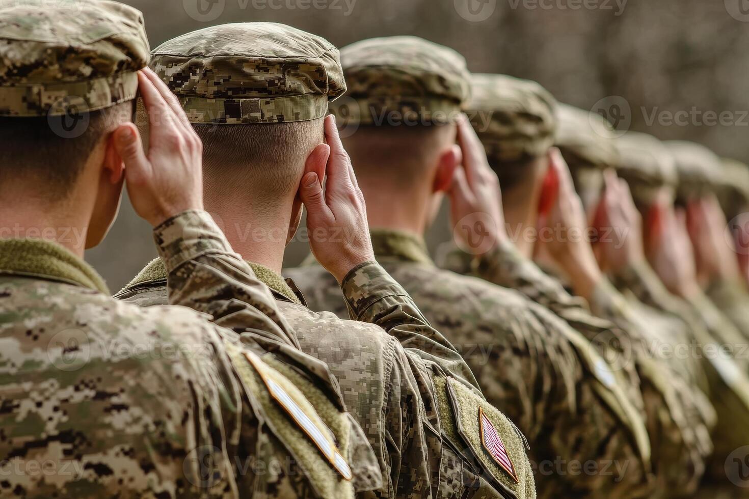 Soldiers in Uniform Saluting During a Ceremony Honoring Veterans with Gigapixel Quality photo
