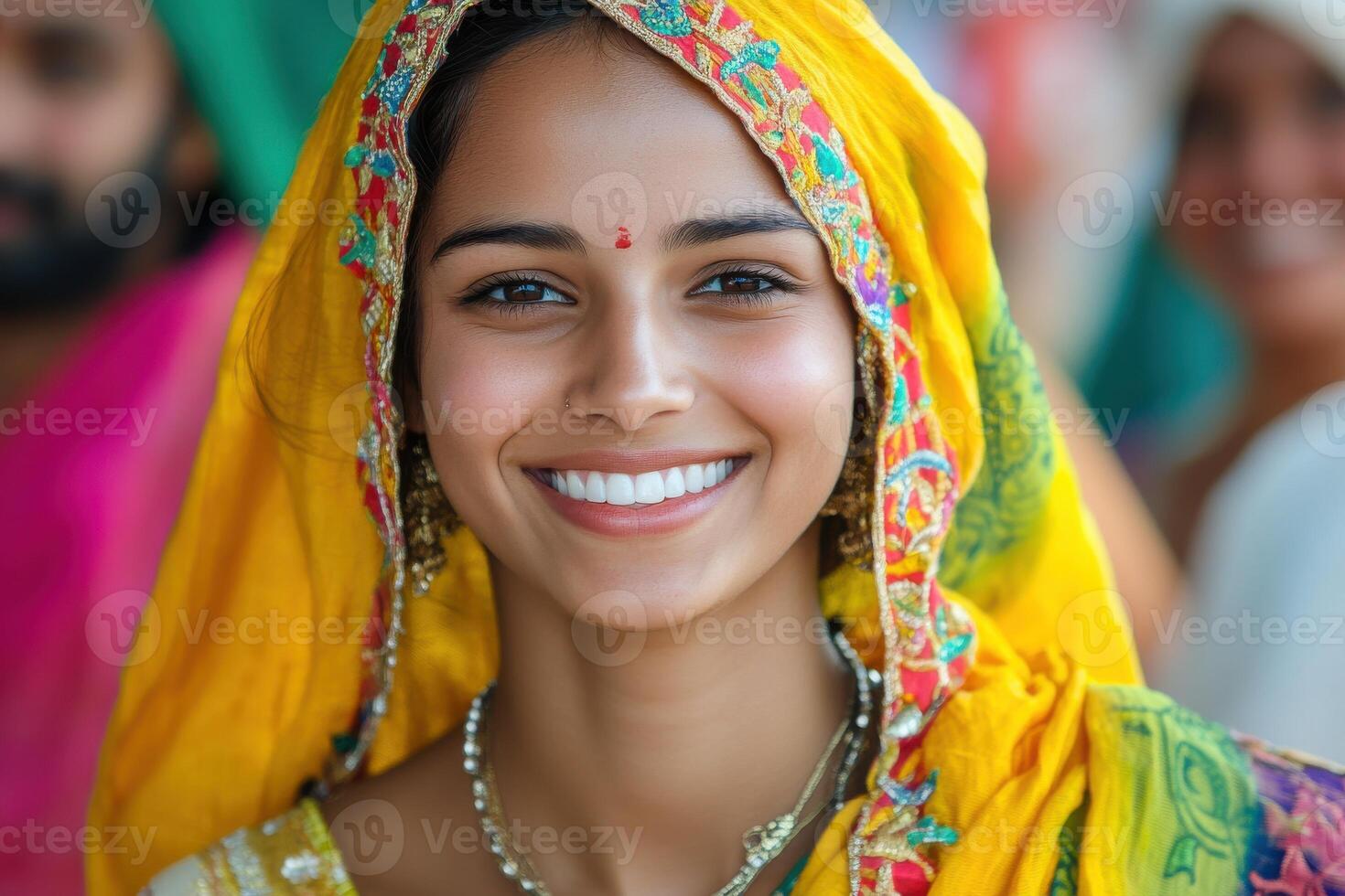Joyful Woman in Colorful Festive Attire Smiling at a Celebration Event photo