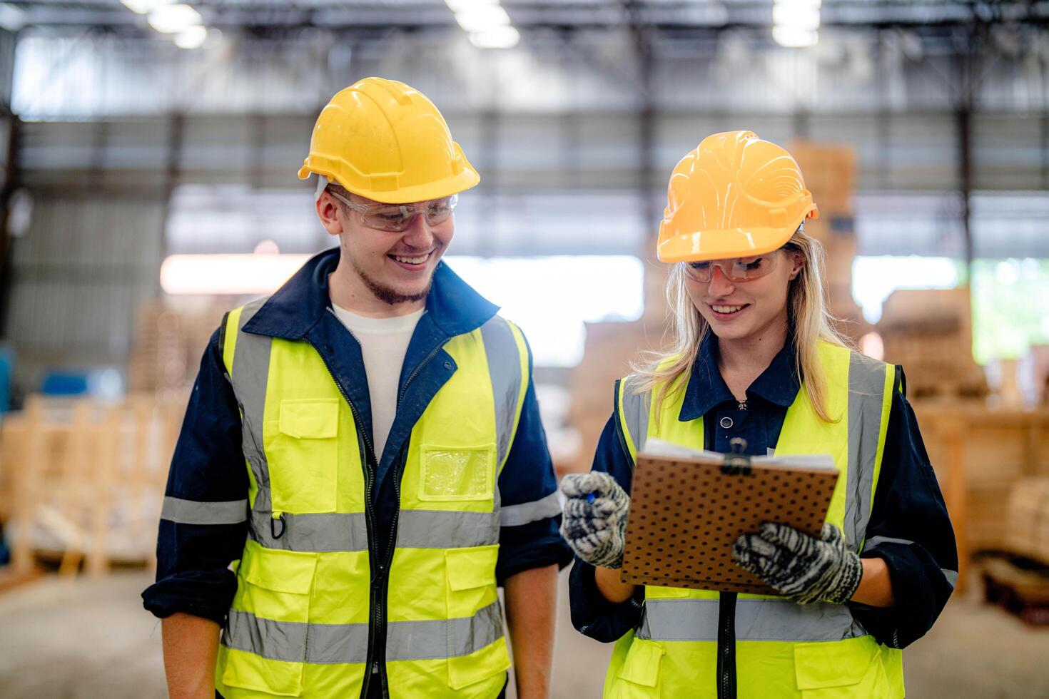 Engineers inspect timbers in the production warehouse to ensure quality and readiness. photo