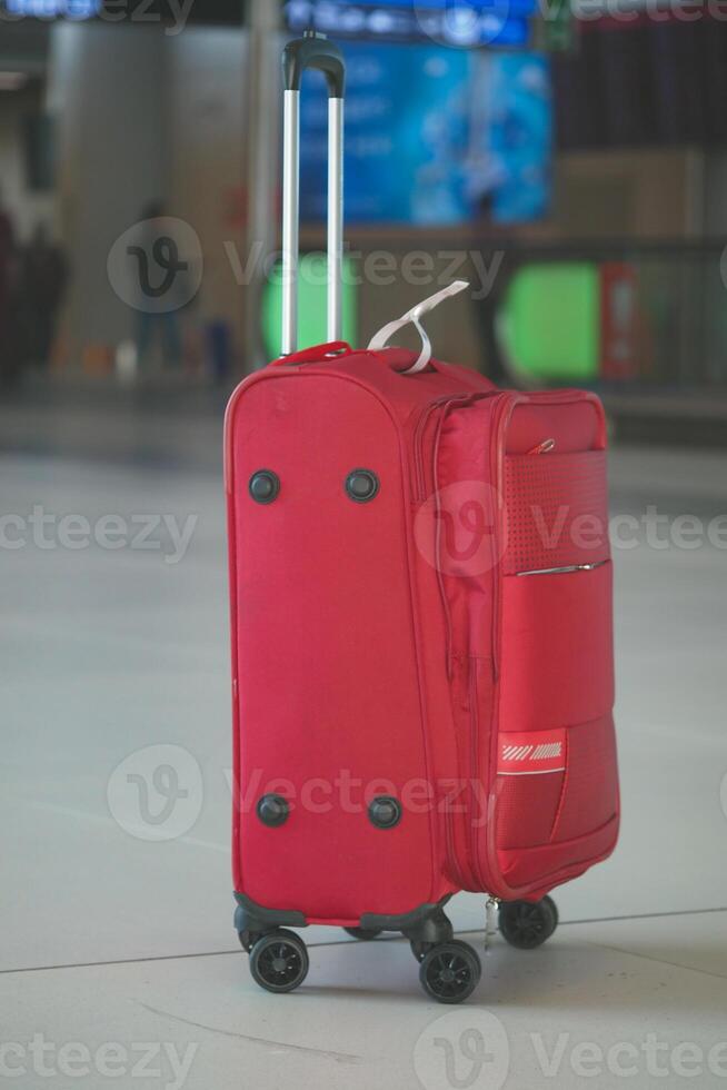 The vibrant and colorful luggage available at the bustling airport terminal is truly eyecatching photo