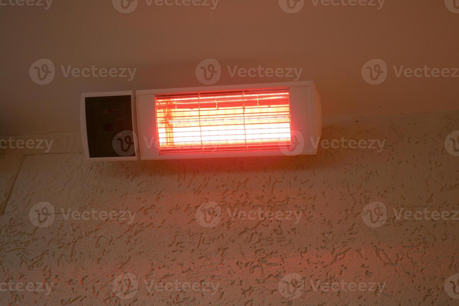 Modern electric infrared heater on celling photo