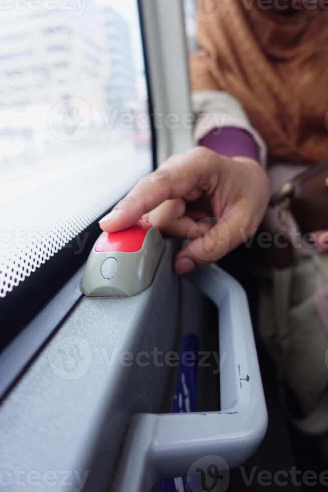 Closeup of Bus bell switch for stop inside the public bus photo
