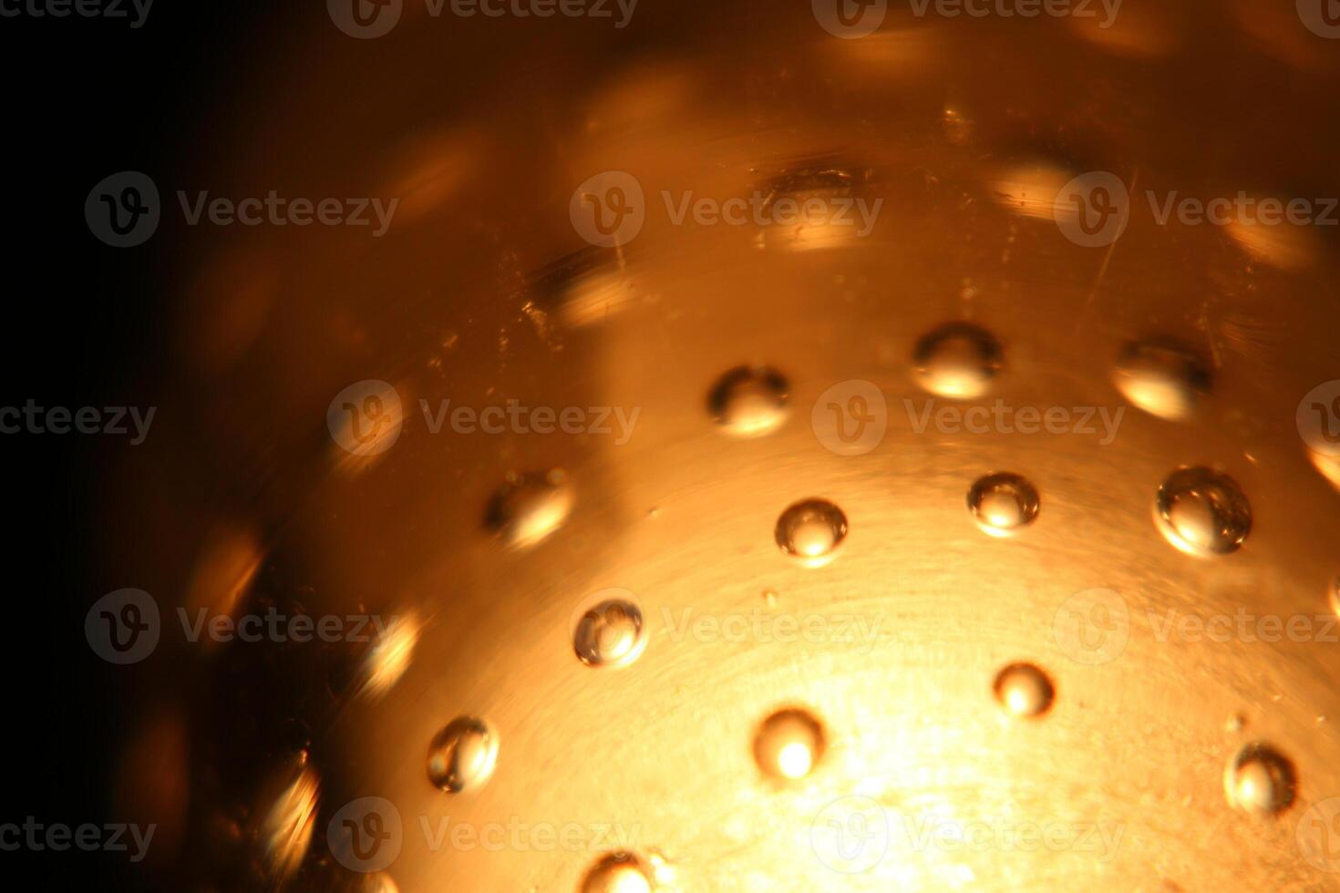 Abstract background of illuminated yellow bubbles photo