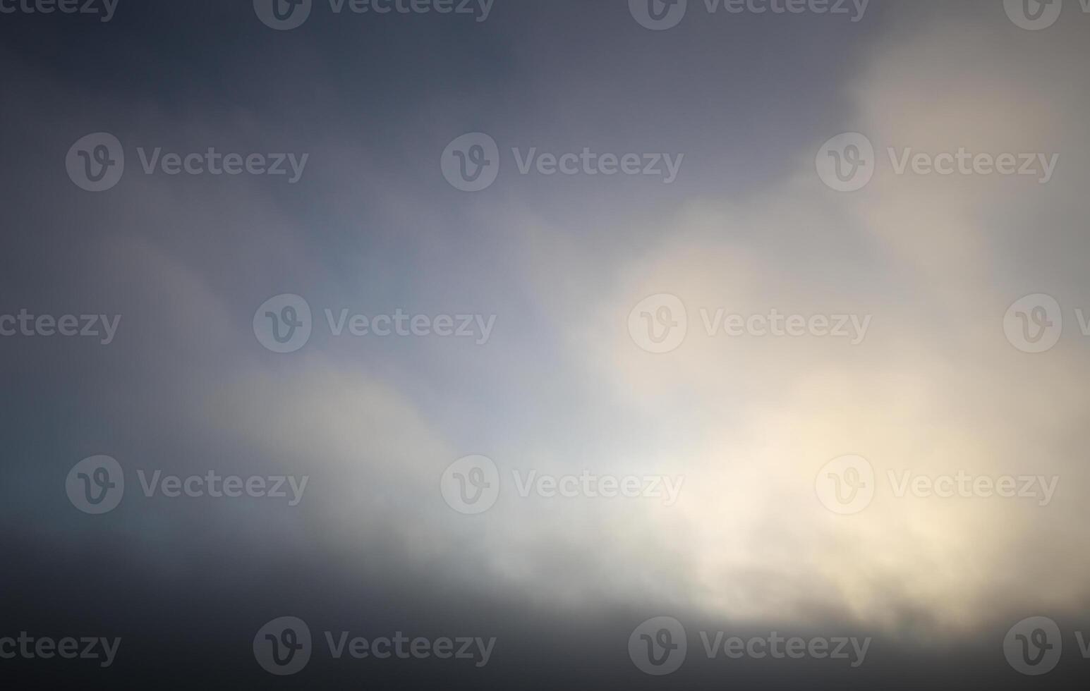 Dark clouds and fog at sunset. photo