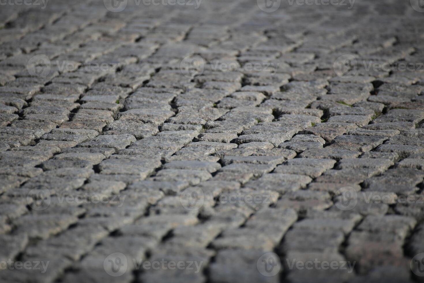 Set paved ground with selective focus effect usable as background. photo