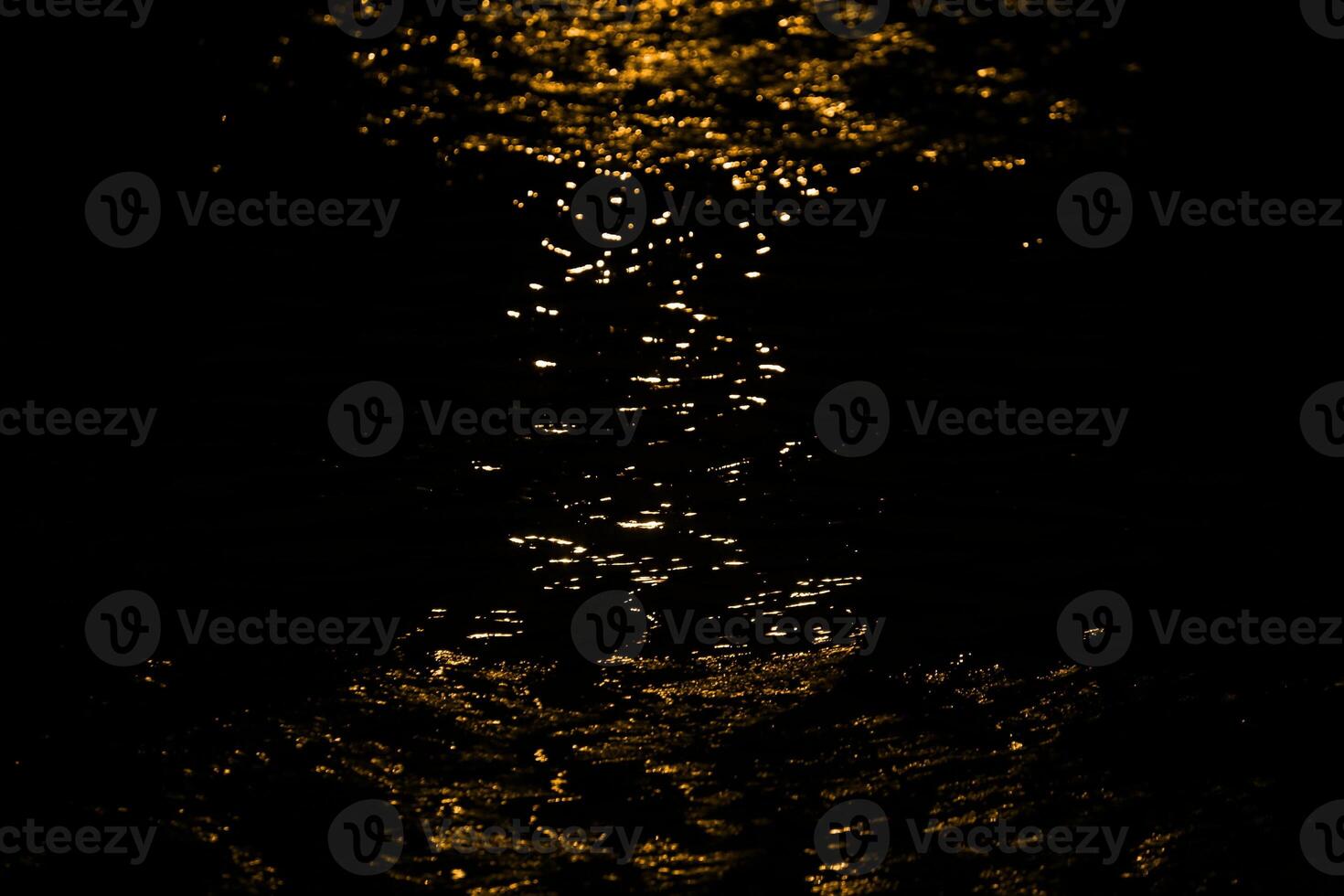 Red light effect on water in hourglass shape. photo