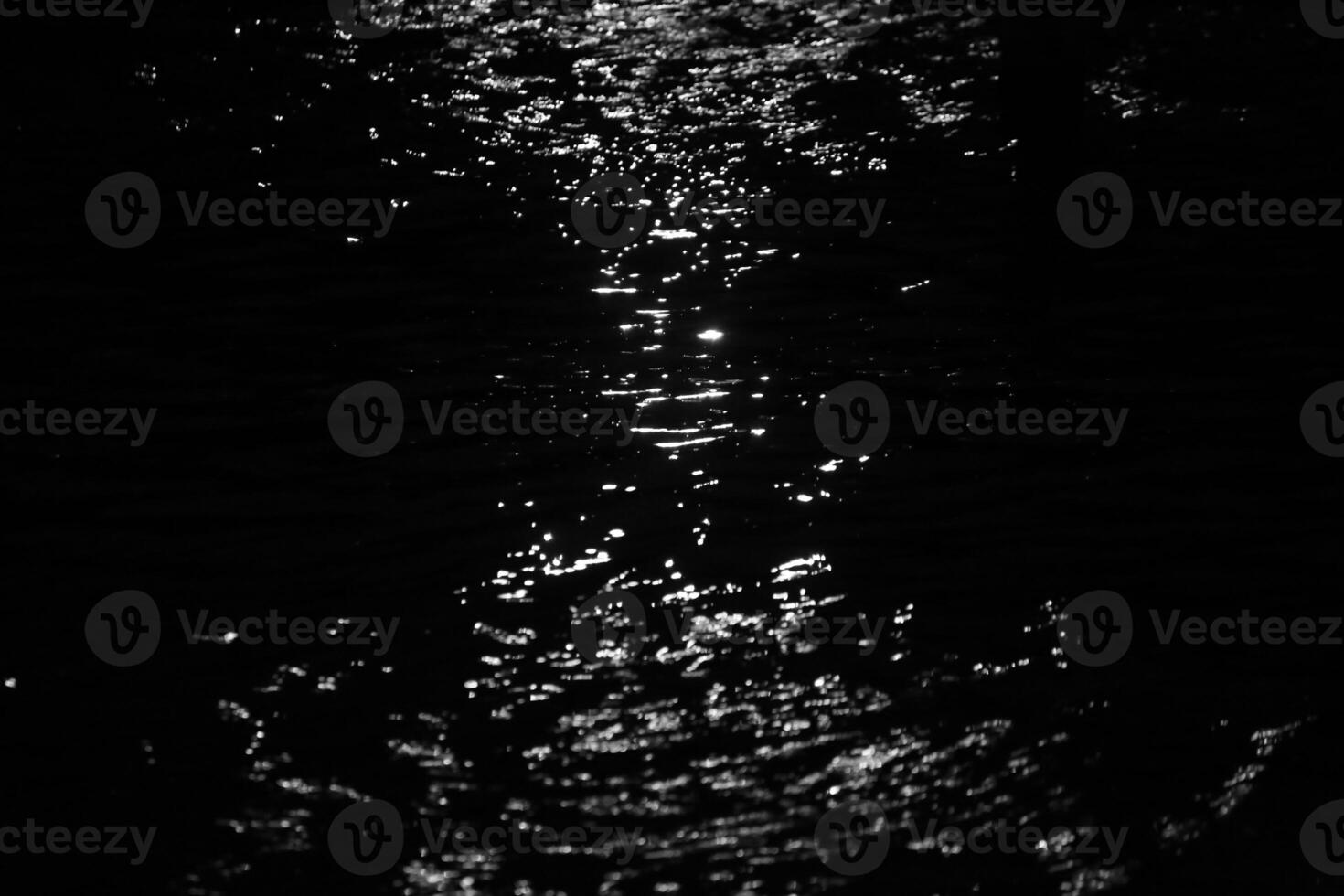 White light effect on water in hourglass shape photo