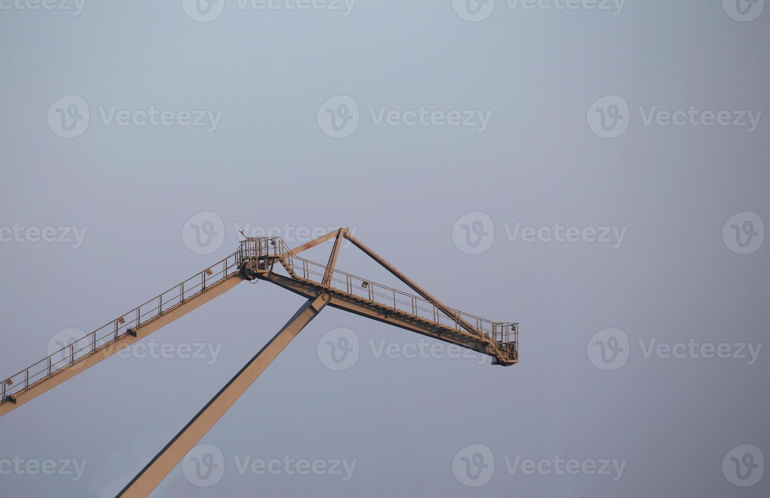 Gray crane in a harbor. photo