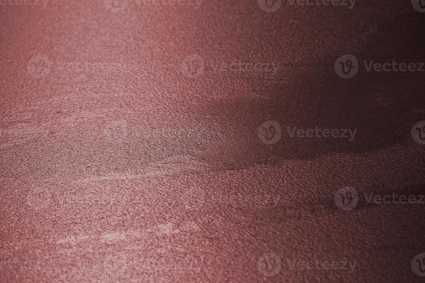 Water surface frozen to a rippled structure with sunlight reflections. The image was toned red to create a new color mood. photo