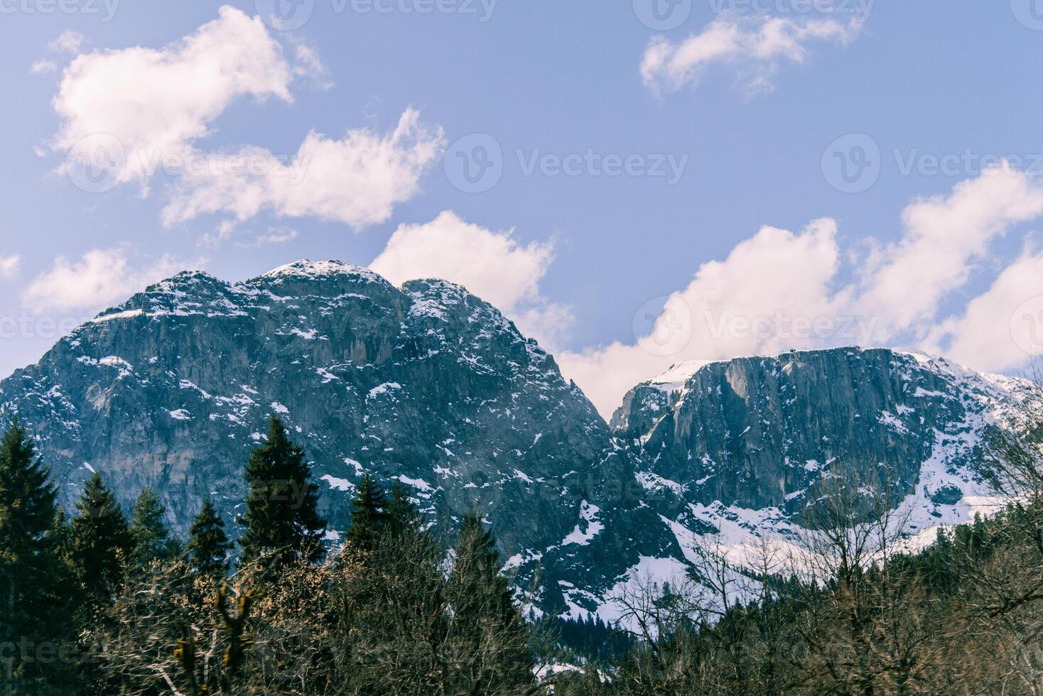 Landscape of snowy mountains, mountain range haze fine winter photo