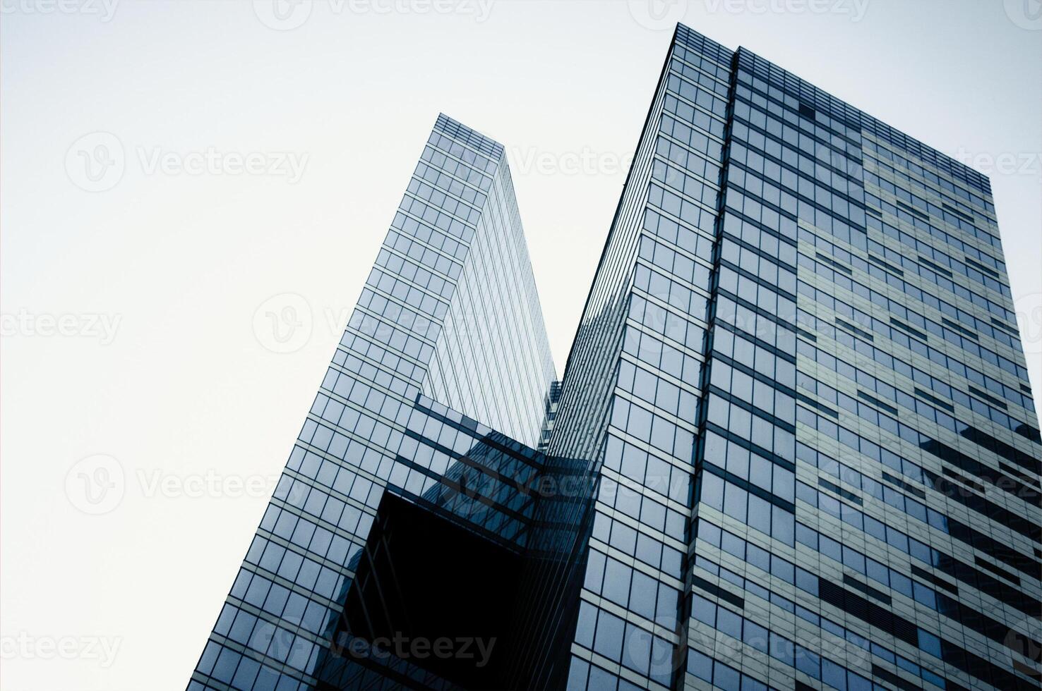 Glass tall blue skyscrapers center big quiet city, buildings background cloudy day sky photo