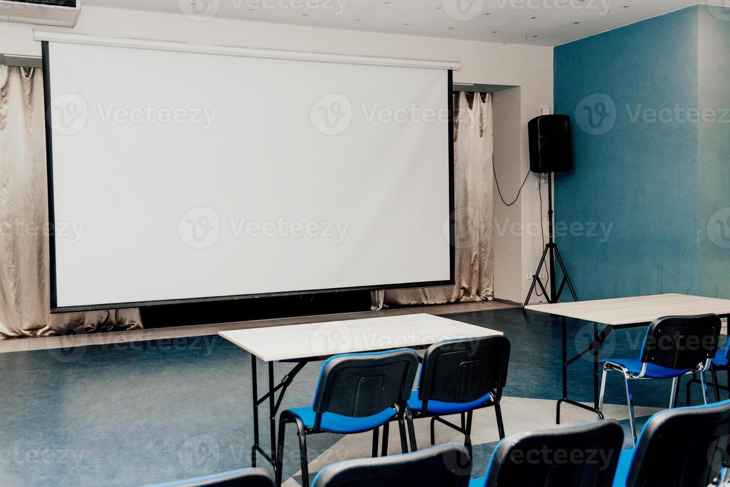 Interior of large classroom, nice student class at institute, conference hall lecture photo