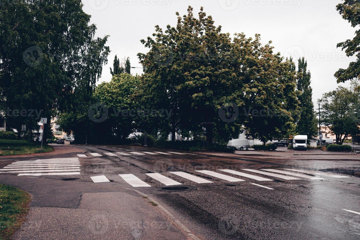 City street cloudy rainy day, deserted dear little town summer day photo