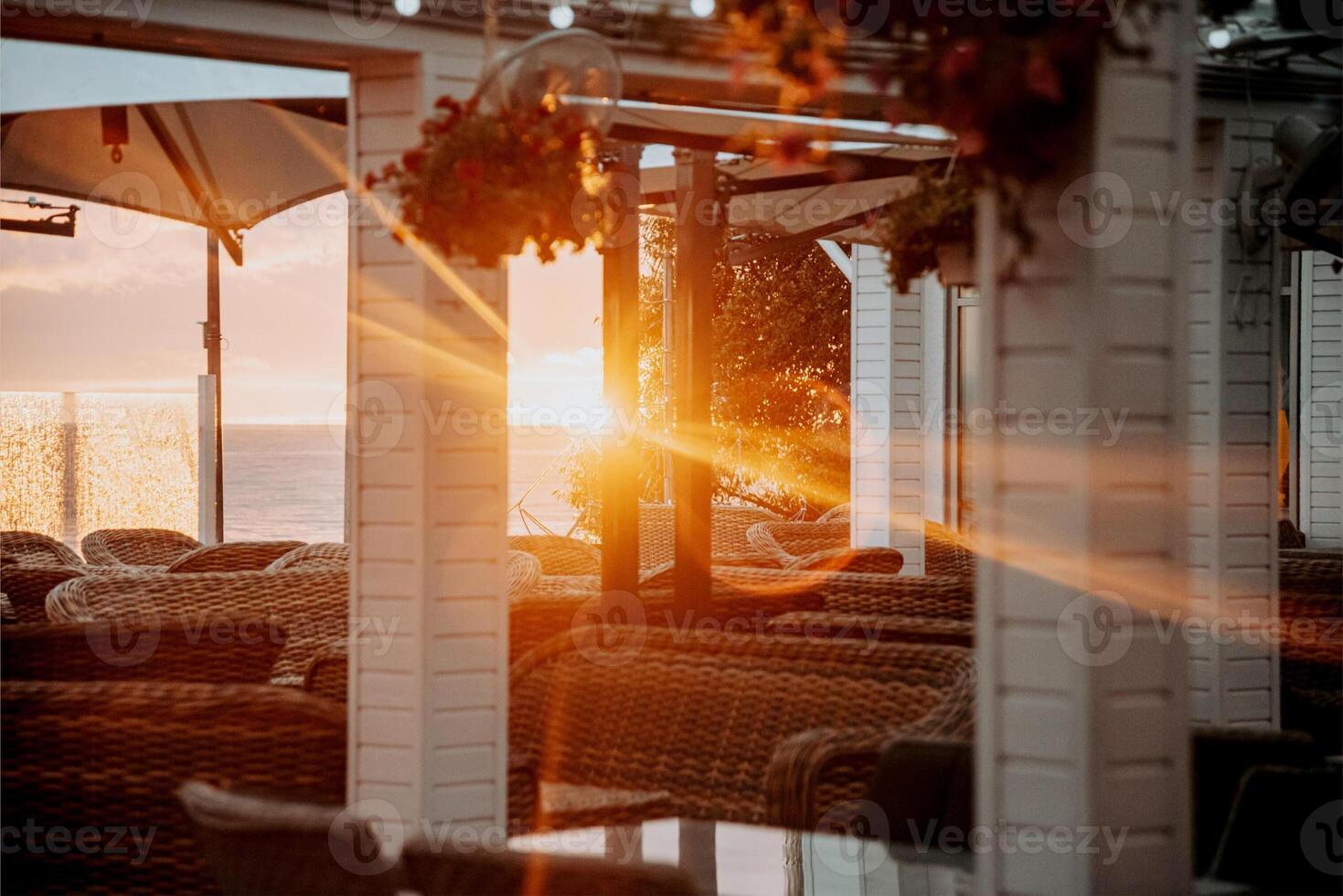 Coffee nice shop on outdoor terrace, deserted veranda overlooking the sea, cityscape photo