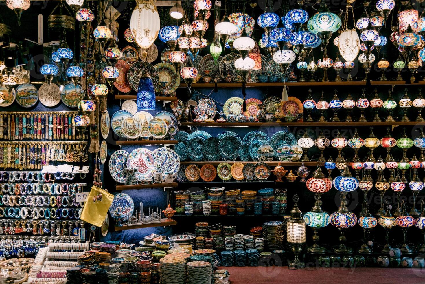 Eastern market sells local beautiful traditional dishes, plates and peas on counter store photo