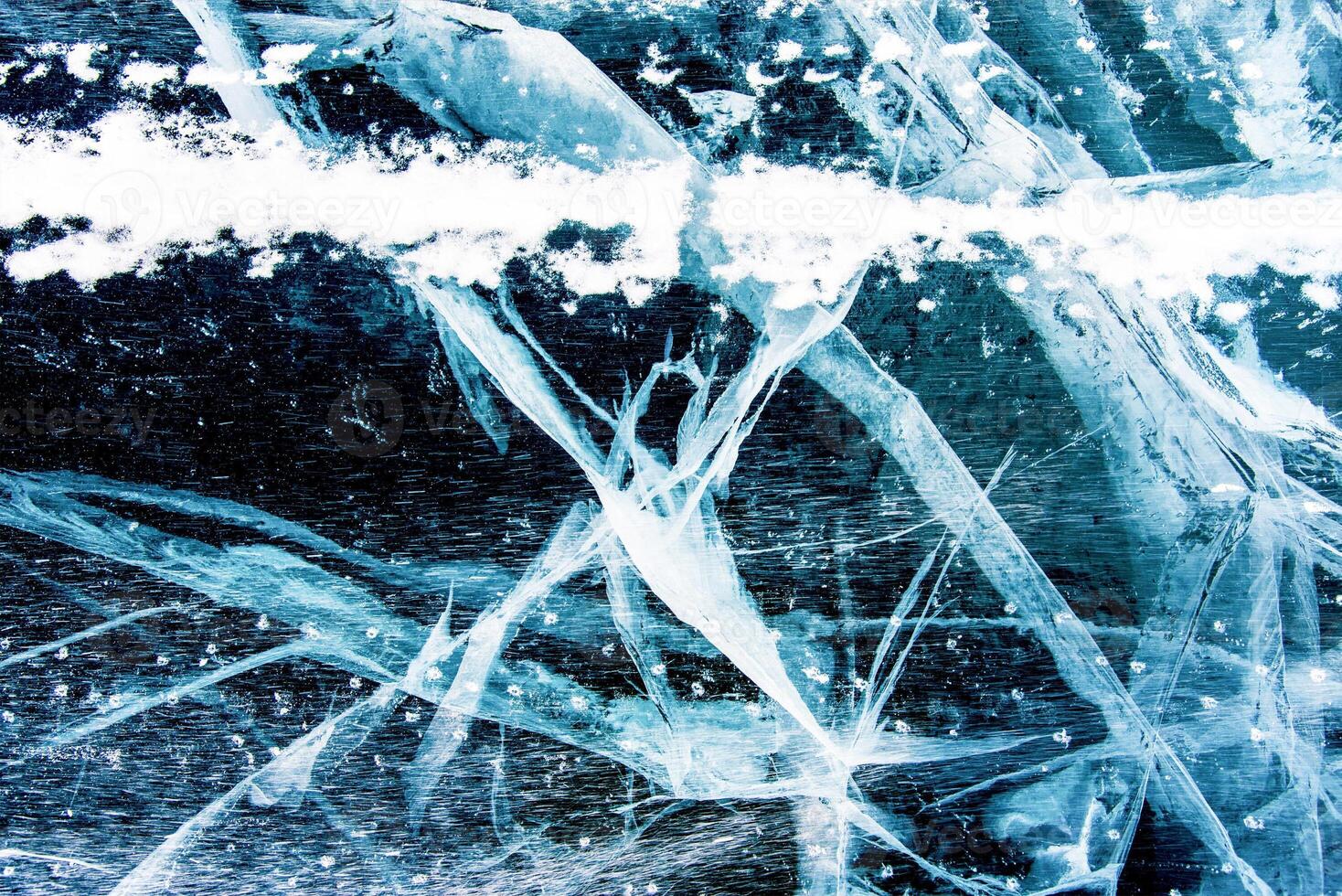Deep blue ice texture, lake water frozen in cold winter, icy wallpaper, white snow photo