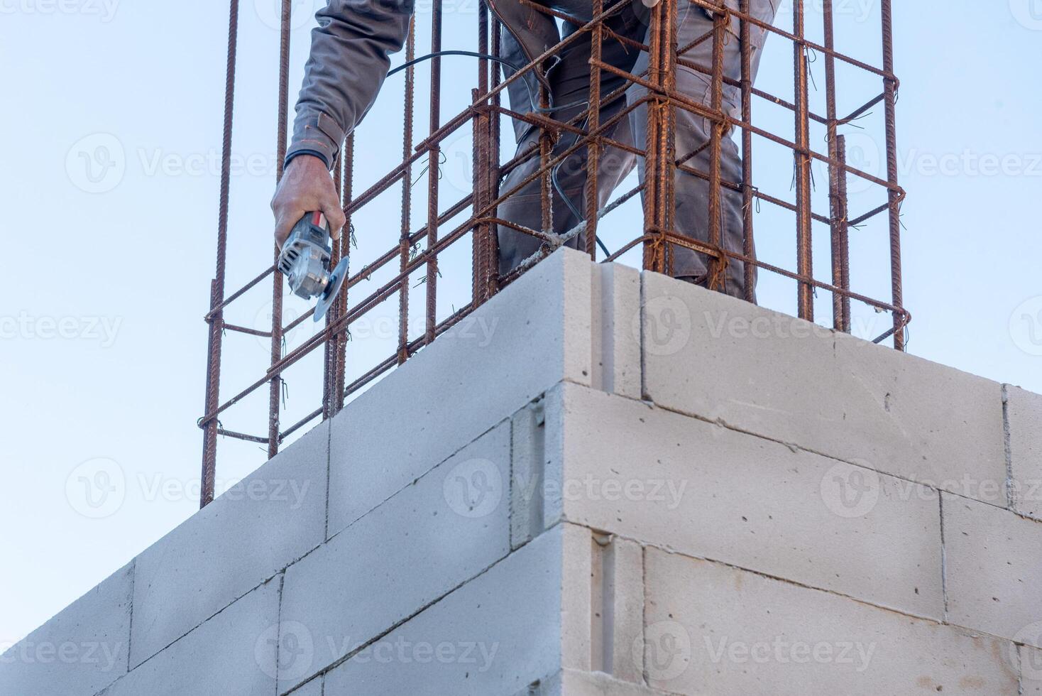 Construction site, man builder building build, metal armature concrete structure photo
