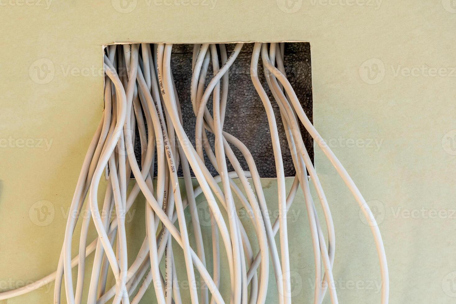 Apartment repair nice, wire stick hole socket drywall wall, wiring electrical circuit photo