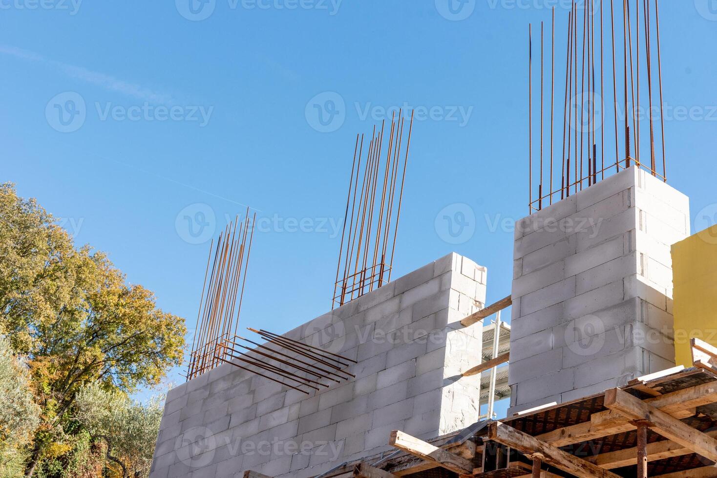 Construction site nice, residential building build, metal armature concrete structure photo