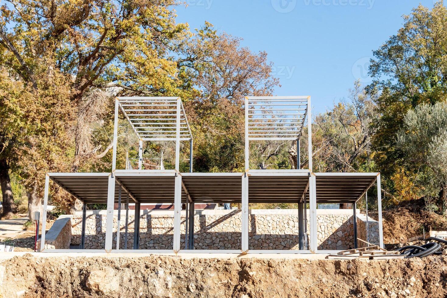 Construction nice site, residential building build, metal armature concrete structure photo