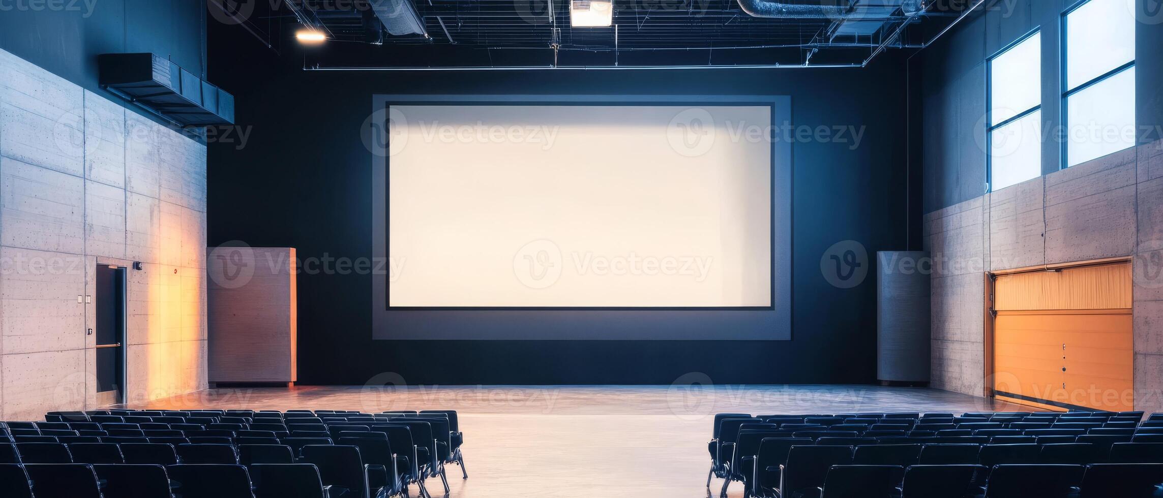 This spacious conference room is equipped with a large projection screen, making it ideal for engaging presentations, dynamic discussions, efficient teamwork, and the development of creative content photo