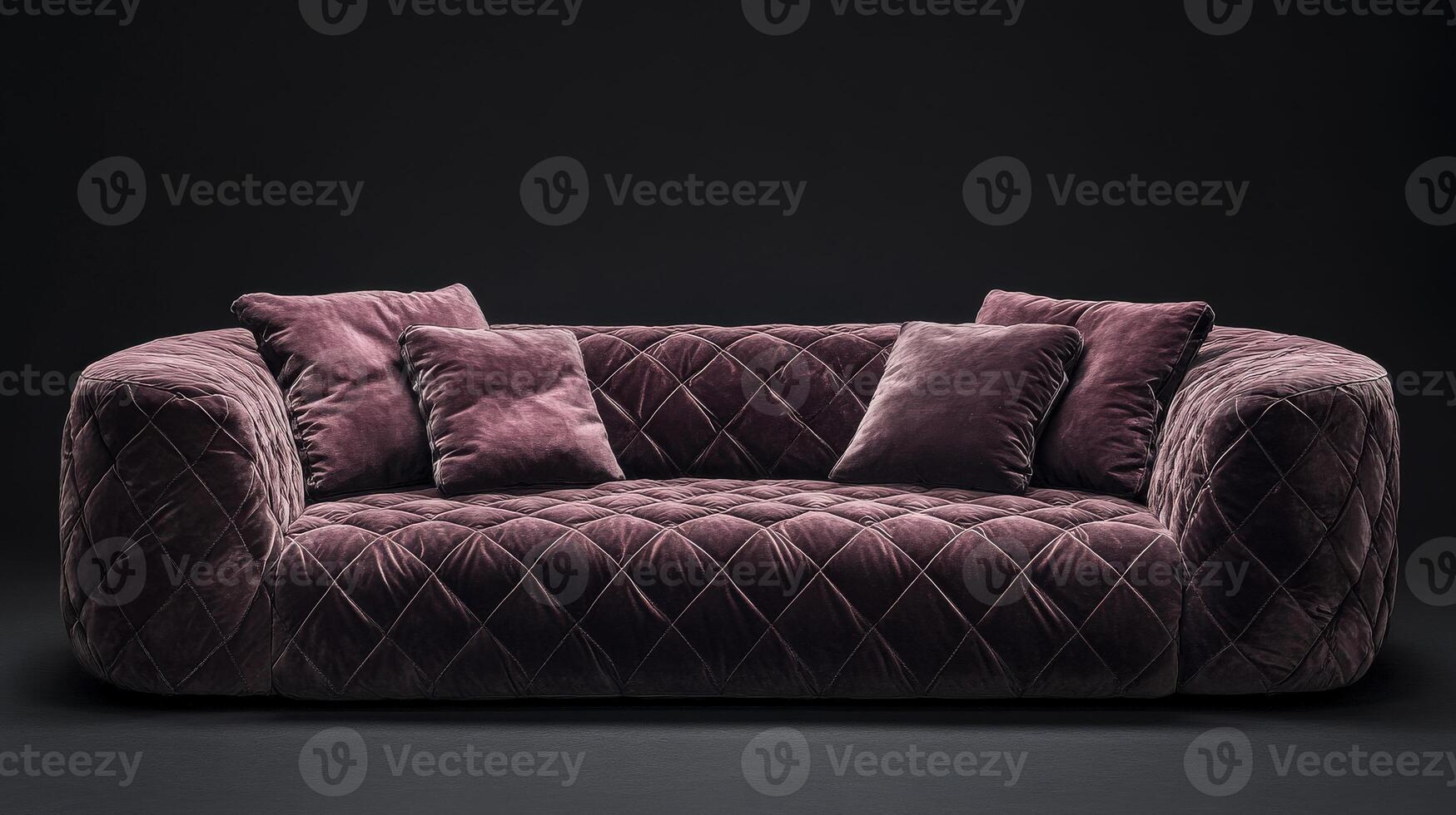 Elegant contemporary velvet sofa with quilted texture in deep plum color photo