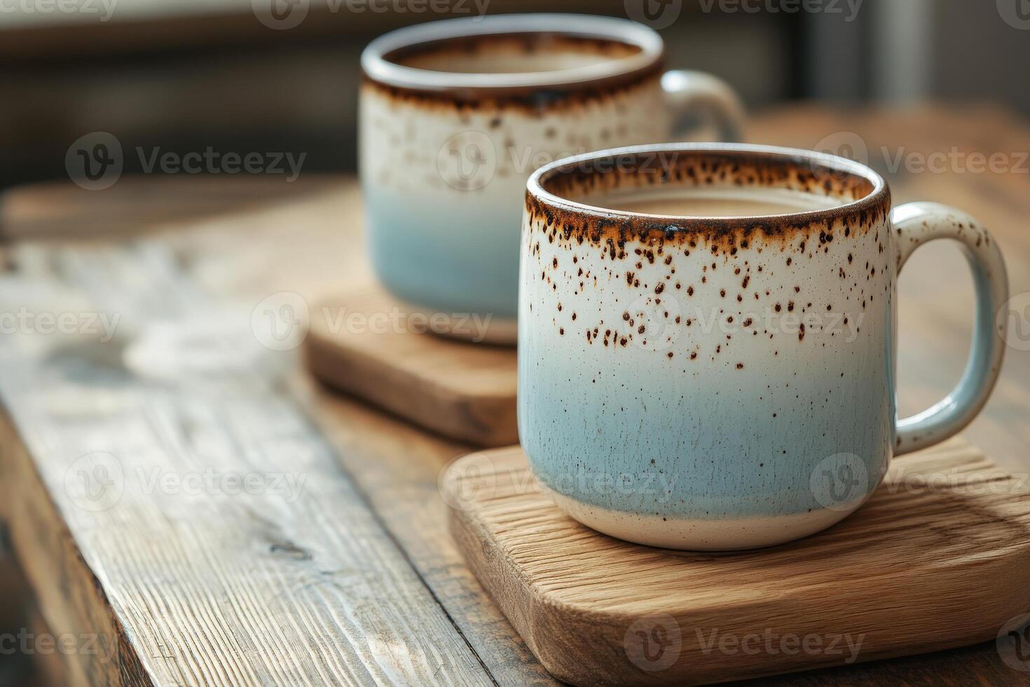 Warm drinks in rustic mugs on a wooden table in cozy setting during morning photo