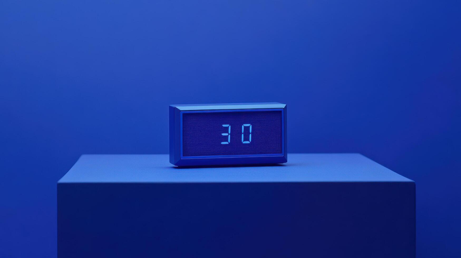 Digital clock displaying time in a serene blue setting on a minimalist platform photo