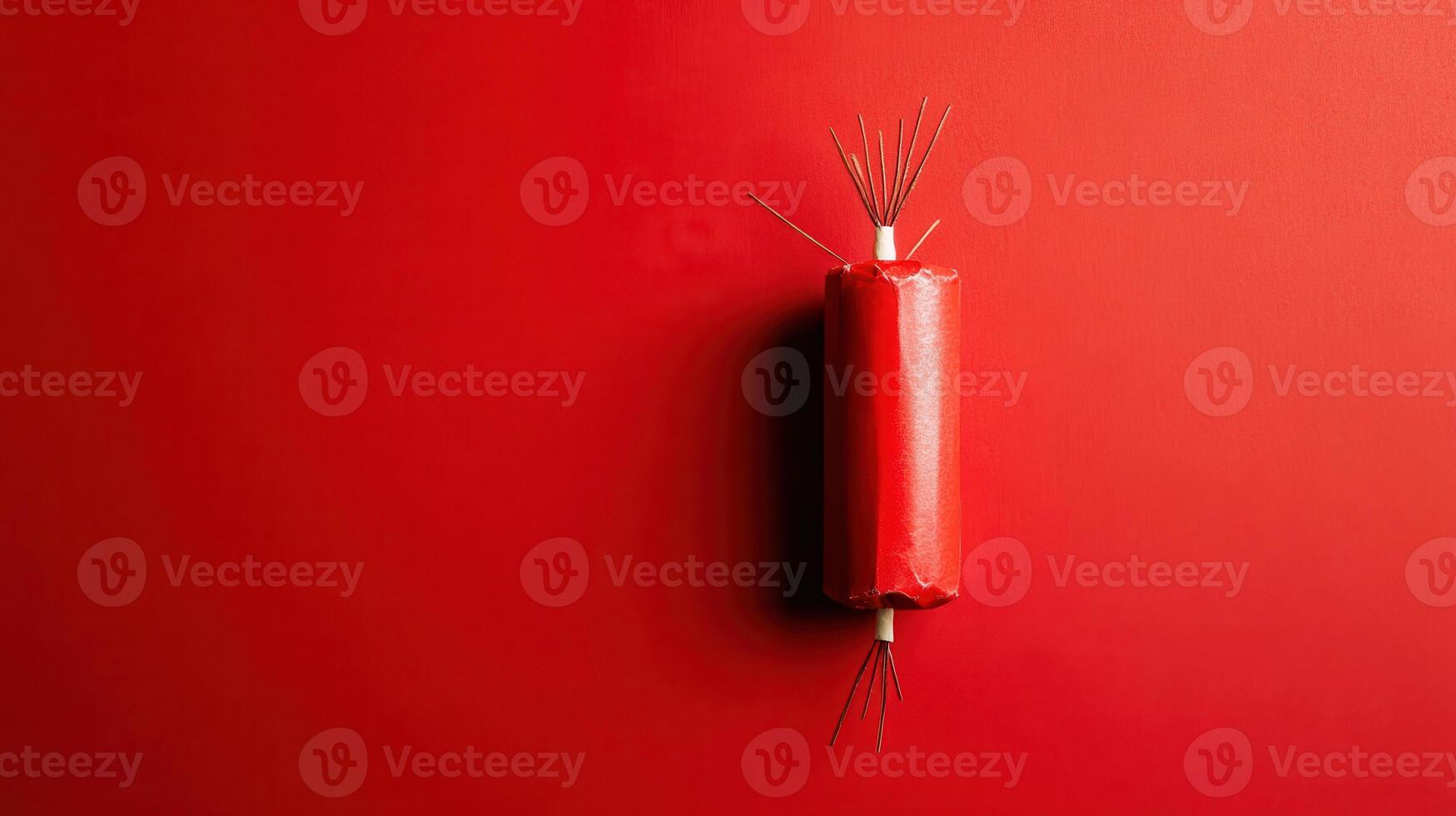 Unique red object mounted on a vibrant red wall showcasing minimalism and creativity in design photo