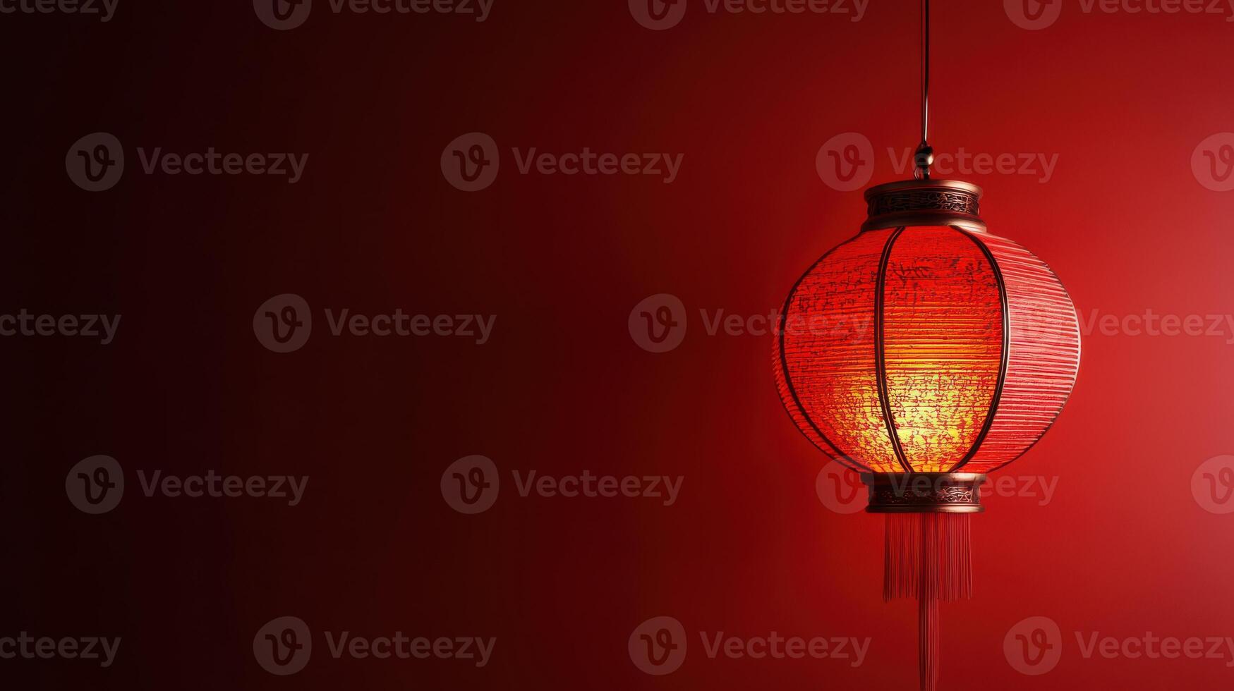 Bright red lantern hanging against a deep red background, capturing the essence of traditional celebrations in Asian culture photo