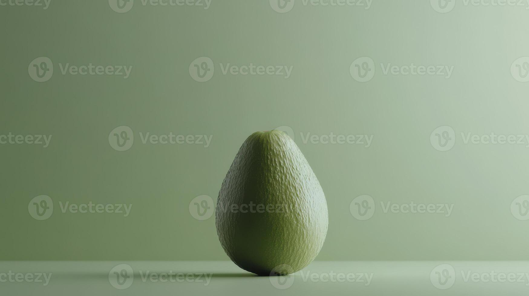 Fresh green avocado displayed on a light surface with a subtle background highlighting its texture and plumpness photo