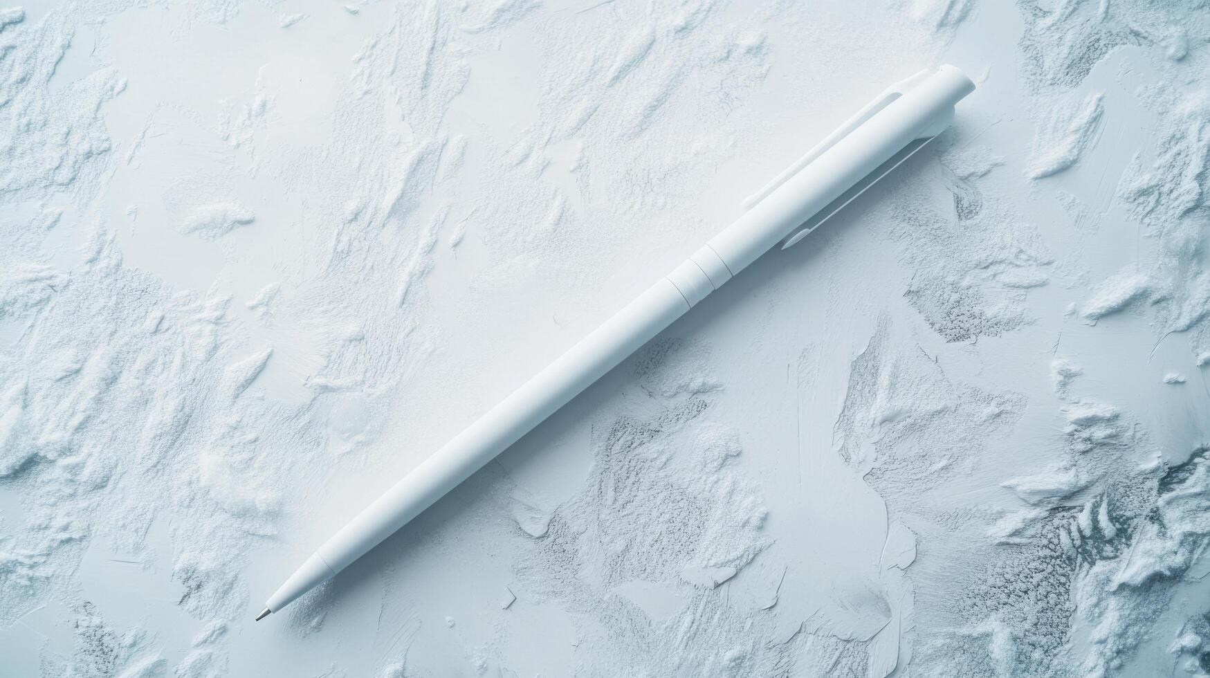 White pen rests on textured surface, creating a minimalistic aesthetic for artistic expression and creativity photo