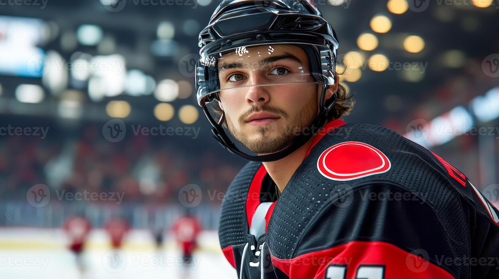 Hockey player in helmet and equipment standing on the ice photo