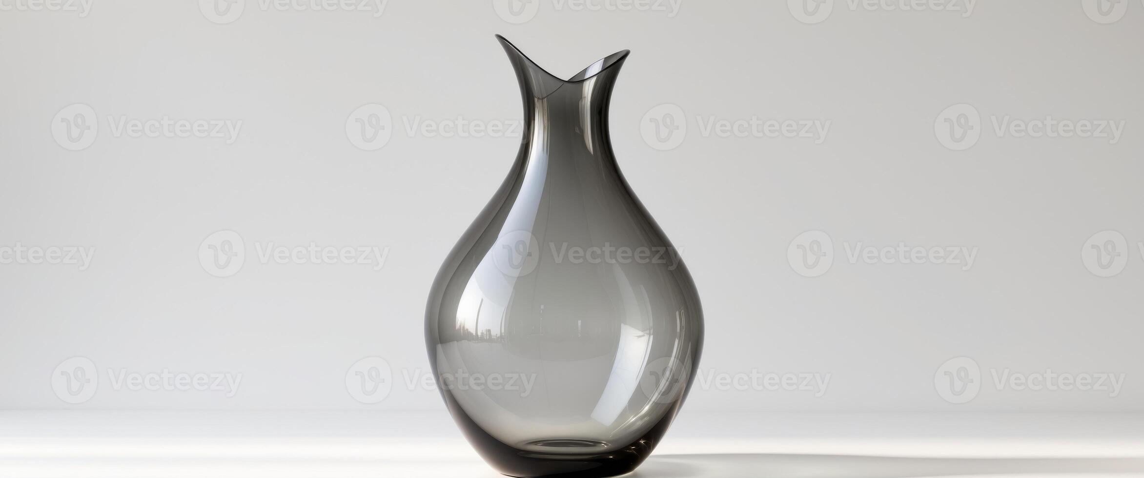 Elegant Smoky Glass Vase with Unique Teardrop Shape DesignElegant Smoky Glass Vase with Unique Teardrop Shape Design. photo
