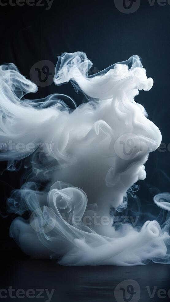 Abstract white smoke swirls against a dark background, creating an ethereal and artistic composition. photo