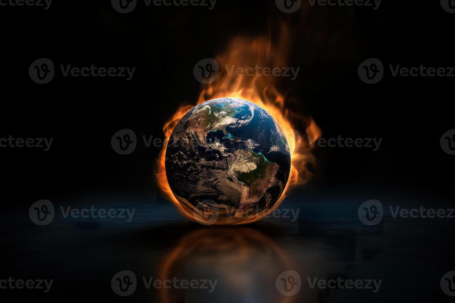 The earth is engulfed in flames against a black background, symbolizing urgent environmental issues and climate change photo