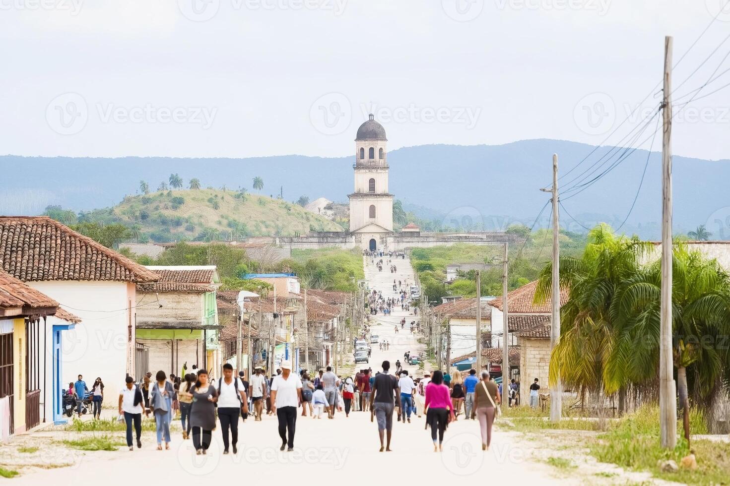Vibrant street life in Cuba with faded colors and historical architecture under a clear sky photo