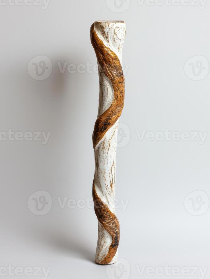 Twisted wooden sculpture with white and brown paint photo
