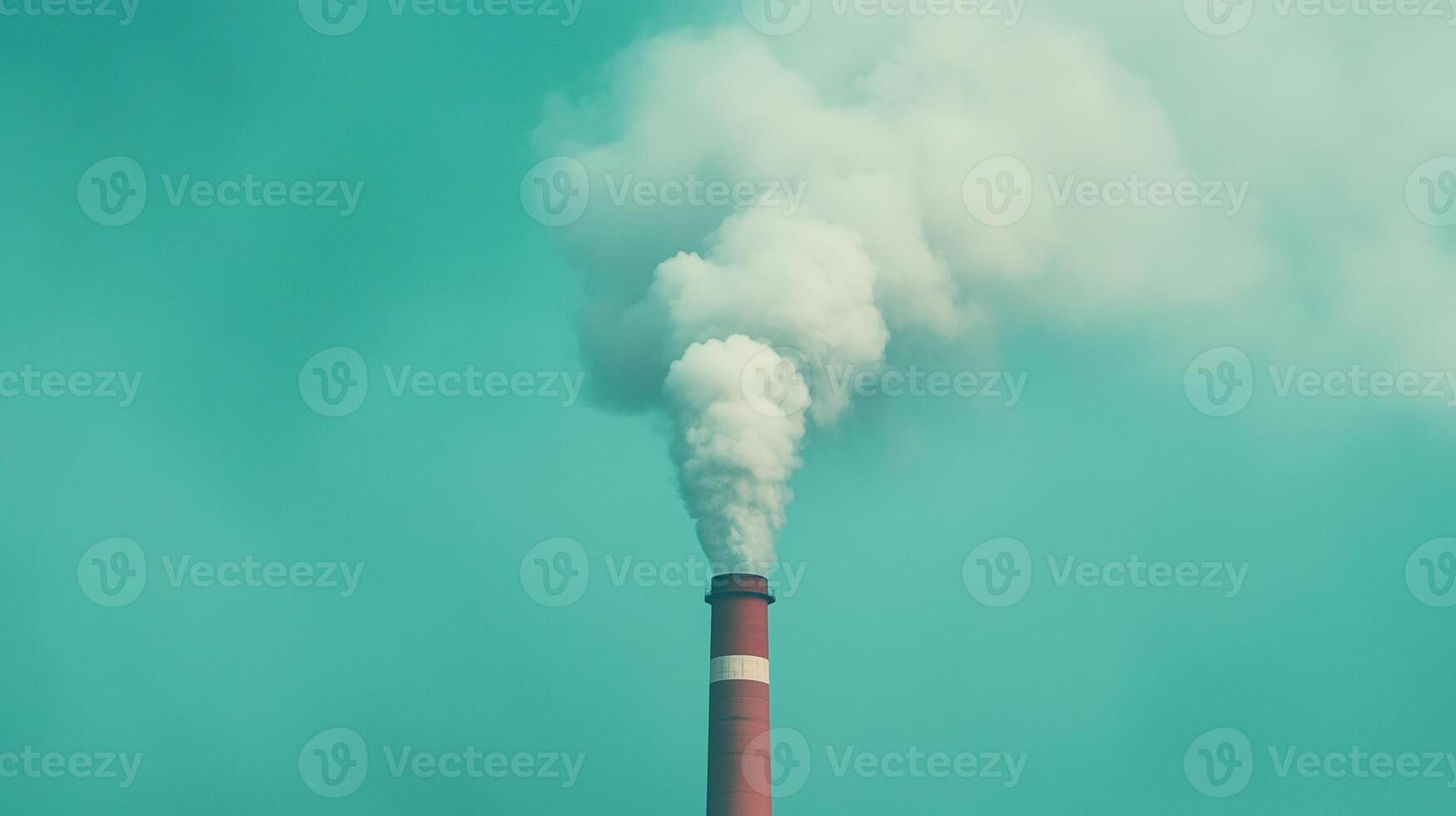 Industrial Power Plant Emitting Thick CO2 Smoke Against Turquoise Sky Highlighting Environmental Impact and Pollution Concerns with Clear Atmospheric Conditions and Dramatic Visual Contrast photo