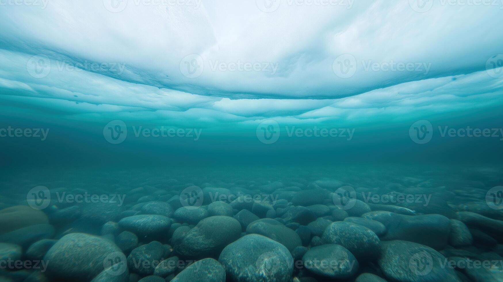 Underwater Iceberg Perspective Showcasing Stunning Above and Below View with Turquoise Waters and Rocks in Raw 169 Format photo
