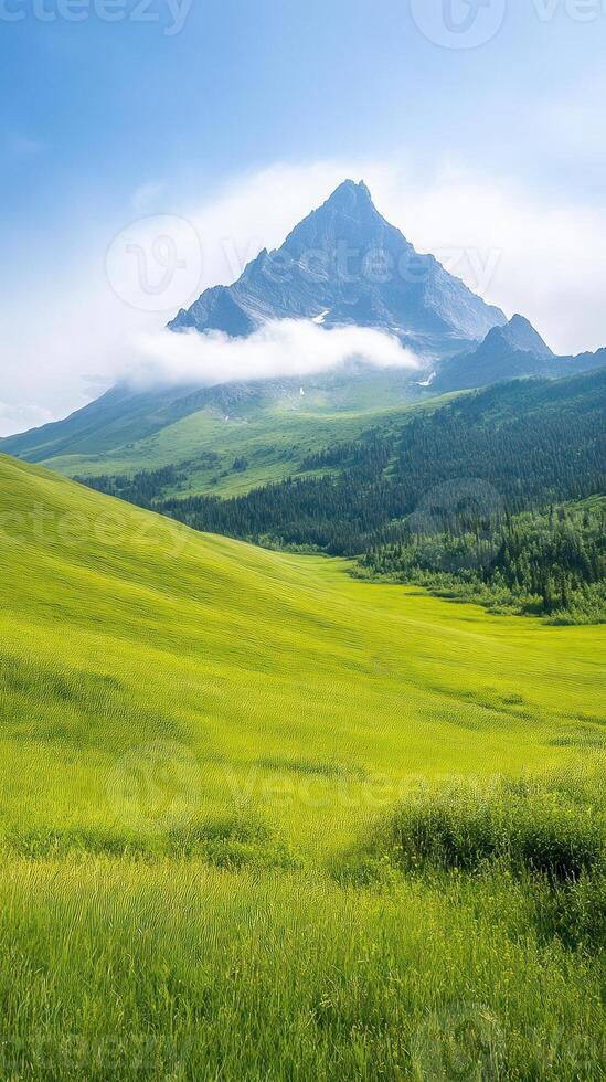 Majestic Clouds Over Breathtaking Mountain with Lush Green Valley Under Blue Sky Offering Stunning Scenic Beauty and Tranquil Atmosphere Ideal for Nature Lovers and Landscape Photography photo