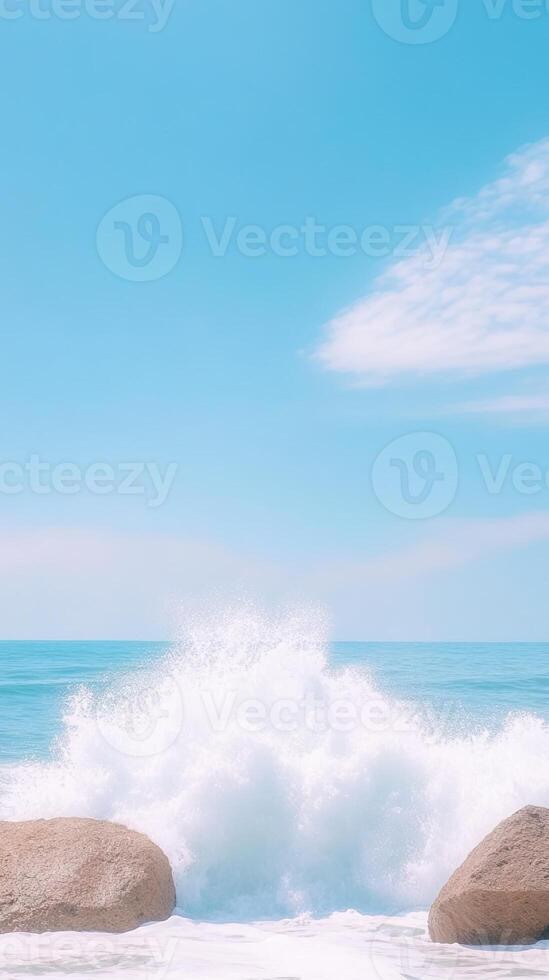 Slow Motion Waves Crashing on Huge Stones Under Clear Blue Sky at the Beach with Calm Ocean and Puffy Clouds Perfect for Summer Themes and Nature Lovers Seeking Serenity and Coastal Beauty photo