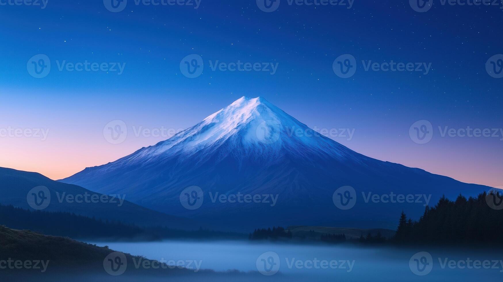 Stunning Snow-Capped Mountain at Twilight Under Starry Night Sky Featuring Majestic Landscape With Deep Blue Atmospheric Vibes and Peaceful Misty Foreground Perfect for Nature Enthusiasts photo