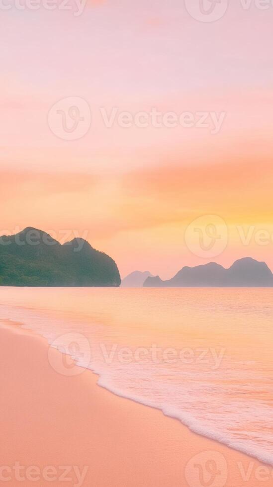 Serenity at Sunrise with Dramatic Orange and Pink Sky over Calm Ocean and Silhouette of Mountains with Gentle Waves on Sandy Beach during Sunrise in a Coastal Landscape photo