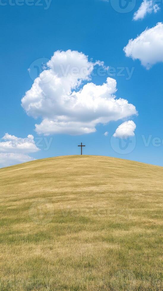 Concept of Redemption with Cross on Hill Against Vibrant Blue Sky and Fluffy Clouds photo