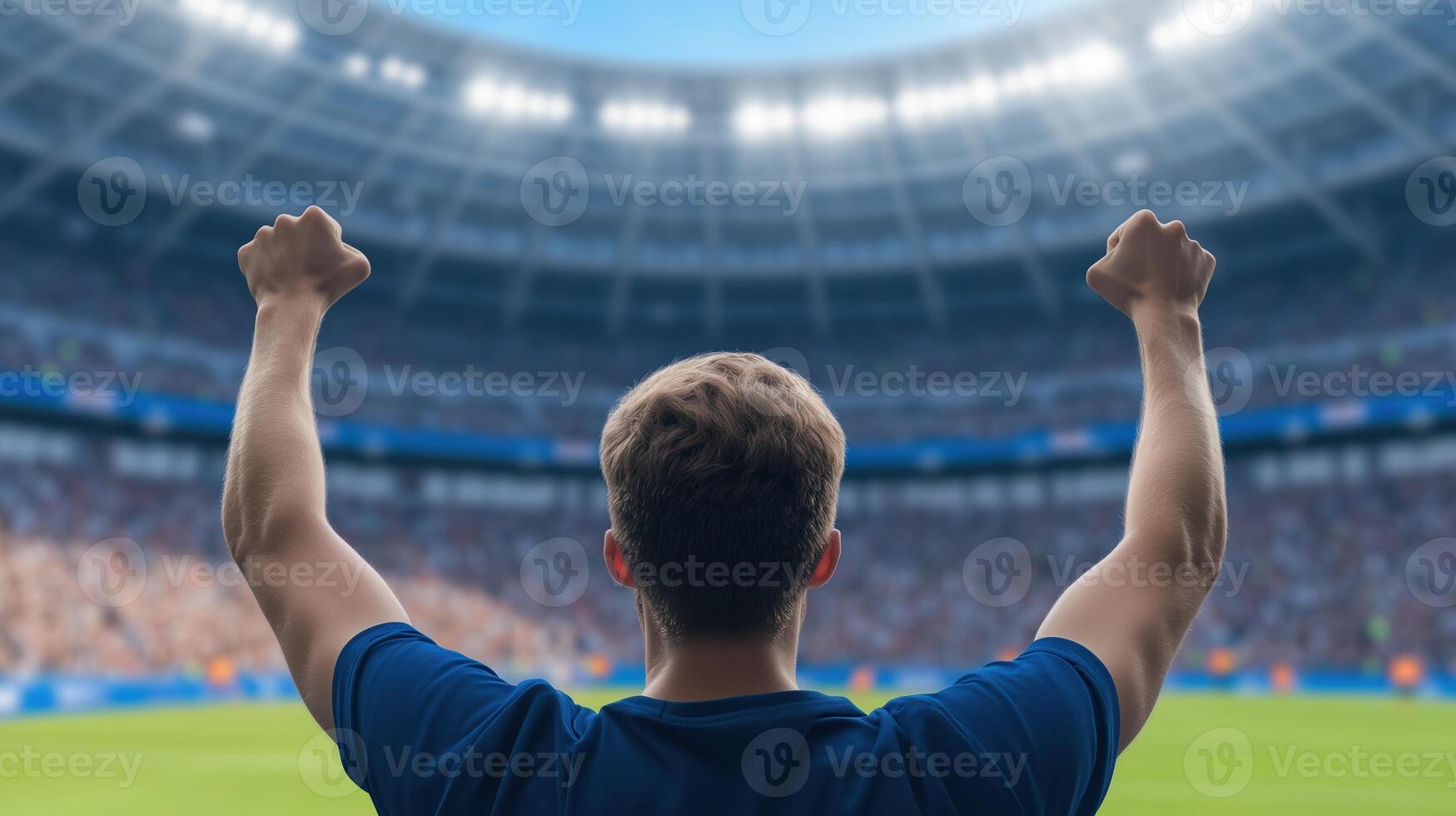 Enthusiastic Sports Fan Cheering in Stadium During Final Match with Vibrant Crowd and Exciting Atmosphere in Large Arena at Sporting Event photo